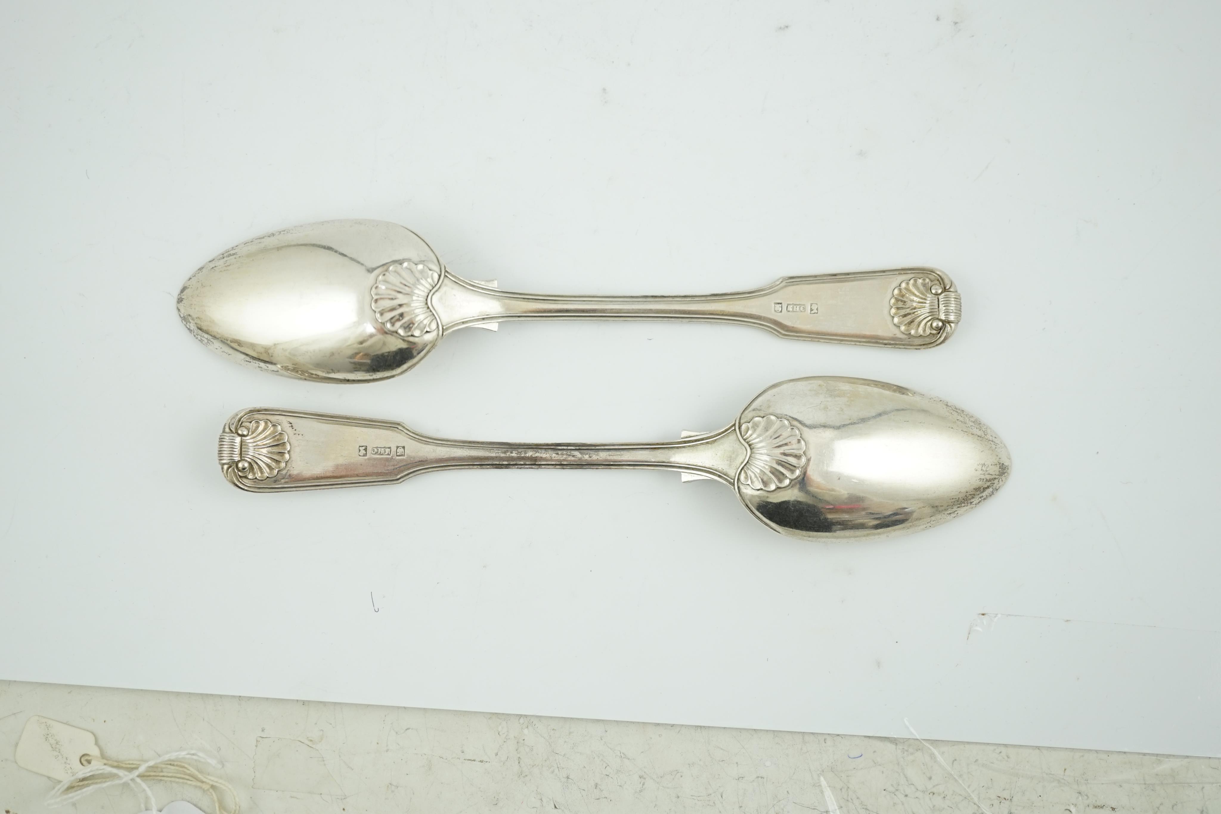 A pair of mid 19th century Chinese Export white metal fiddle, thread and shell pattern table spoons, by Khecheong, Canton